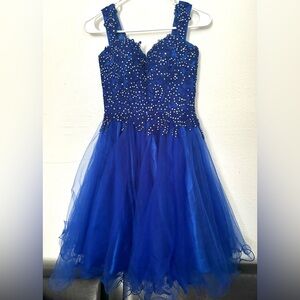 Short blue ballroom dress with a jeweled corset top